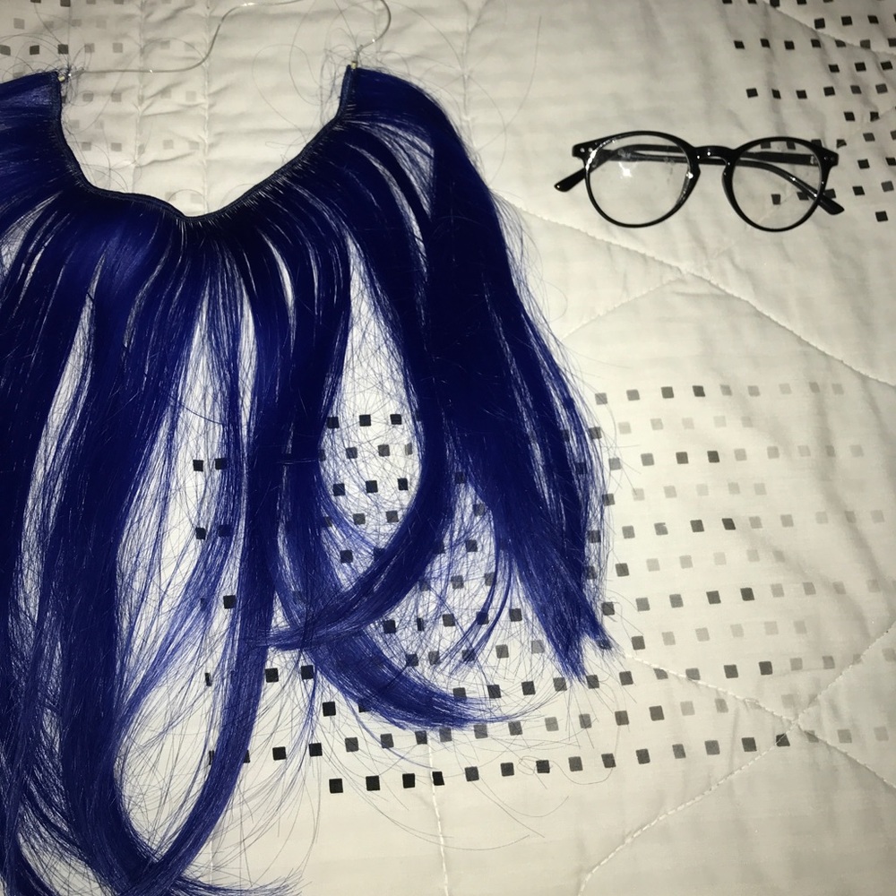 Electric blue hair extensions and fake glasses